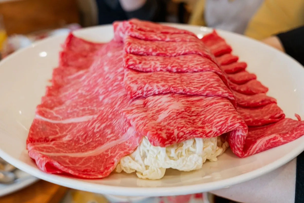 お粥鍋に入れる牛肉